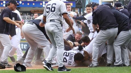 Detroit Tigers' Miguel Cabrera fights with New York Yankees' Aaron Judge during a bench-clearing fight in the sixth inning. yankees-tigers