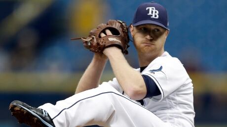 Tampa Bay Rays starting pitcher Alex Cobb goes into his windup against the Toronto Blue Jays during the first inning on Thursday in St. Petersburg, Fla. cobb-alex-082417-620