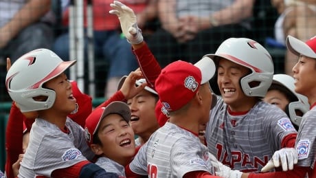 Japan celebrates their game ending run in the 5th-inning to defeat Lufkin from Texas 12-2 in the champioinship game of the Little League World Series, in South Williamsport, Pa. on Sunday. Japan-LLWS-27082017