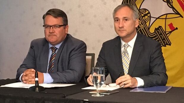 Health Minister Victor Boudreau, Bernard Lord, CEO of Medavie