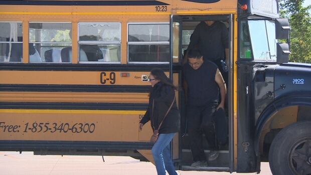Evacuees reach the temporary shelter at the Winnipeg Soccer Federation's Winnipeg Soccer North indoo