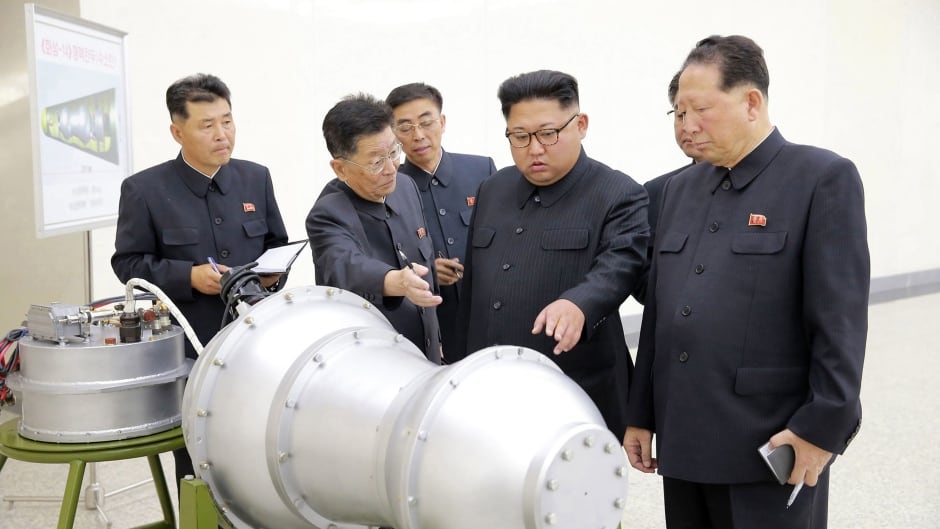 This undated file photo distributed on Sunday, Sept. 3, 2017, by the North Korean government, shows North Korean leader Kim Jong-n, second from right, at an undisclosed location in North Korea.