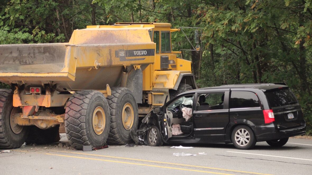6 taken to hospital after dump truck rolls into traffic in Coquitlam