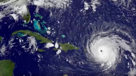 Hurricane Irma barrels toward Florida, upper left, as a category 5 storm. Hurricane Irma
