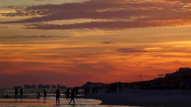 A beach at sunset is traditional Instagram fodder, suitable for viewing by parents and potential employers. This one is in Seaside, Fla. But to express themselves more freely, some users are creating "fake" social media accounts using names recognized only by close friends.
