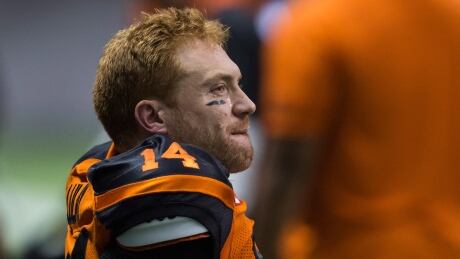Tears run down B.C. Lions' quarterback Travis Lulay's face as he sits on the sideline after leaving the game against the Montreal Alouettes with a knee injury on Friday, in Vancouver. Lulay-Travis-08092017