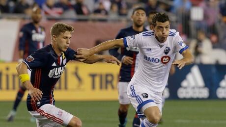 Blerim Dzemaili, right, of the Impact, races New England Revolution midfielder Scott Caldwell for the ball during Montreal's 1-0 loss on Saturday, in Foxborough, Mass. Impact-Revolution-09092017