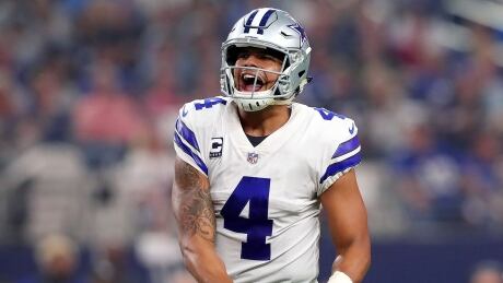 Dak Prescott of the Cowboys celebrates during Dallas' 19-3 win over the New York Giants on Sunday, in Arlington, Texas. Giants-Cowboys-10092017