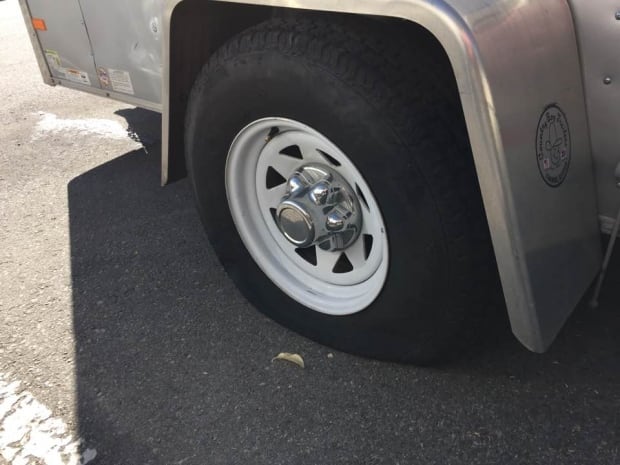 Monk Trailer Tire Slashed