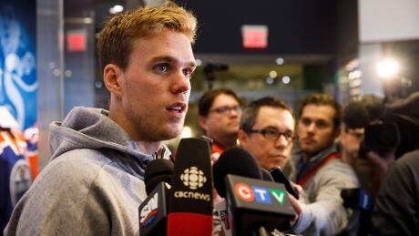 The Edmonton Oilers are facing questions about who will ride shotgun on superstar Connor McDavid's line. Connor McDavid