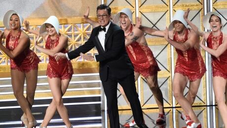 Host Stephen Colbert performs at the 69th Primetime Emmy Awards on Sunday, Sept. 17, 2017, at the Microsoft Theater in Los Angeles. APTOPIX 2017 Primetime Emmy Awards - Show