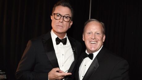 IMAGE DISTRIBUTED FOR THE TELEVISION ACADEMY - Stephen Colbert, left, and Sean Spicer pose backstage at the 69th Primetime Emmy Awards on Sunday, Sept. 17, 2017, at the Microsoft Theater in Los Angeles. (Photo by Dan Steinberg/Invision for the Television Academy/AP Images) 69th Primetime Emmy Awards - Backstage