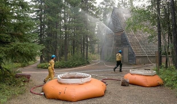 Fire crew testing the sprinkler system at Crandell Theatre