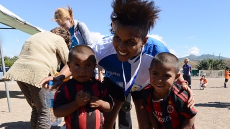 Karina Leblanc poses with Honduran children during a 2013 trip as a UNICEF goodwill ambassador. Mvd6491705