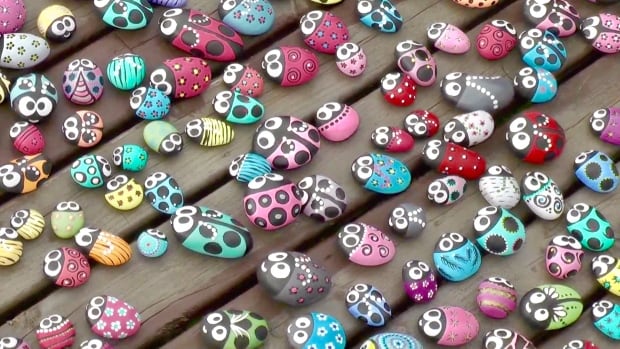 ladybug rocks on the deck