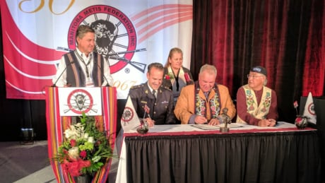 RCMP Deputy Commissioner Kevin Brosseau and MMF president David Chartrand signed a memorandum of understanding for the return of Louis Riel artefacts on Saturday in Winnipeg. Signing over Metis artifacts