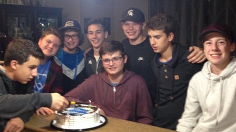 Cole Kinney, centre, and his friends came across a lost boy standing in the rain in Brandon on Friday. cole kinney friends