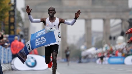 Kenya's Eliud Kipchoge crosses the line to win the 44th Berlin marathon in Berlin, Germany, on Sunday. APTOPIX Germany Berlin Marathon