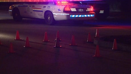 Orange cones cover several shell casings left in front of the south Surrey home. SOUTH SURREY SHOOTING SHELL CASINGS