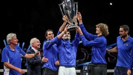 Members of Team Europe hold the trophy as they celebrate winning the Laver Cup tennis tournament over Team World in Prague on Sunday. laver-cup-092417-620