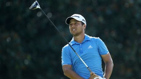 Xander Schauffele of the United States plays his shot from the 14th tee during the final round of the Tour Championship. tour-championship
