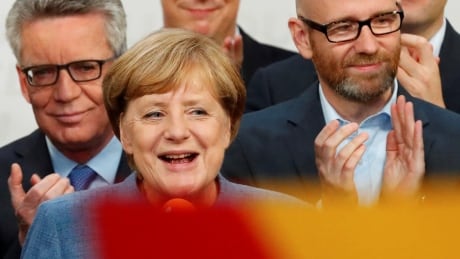 Christian Democratic Union CDU party leader and German Chancellor Angela Merkel reacts after winning the German general election (Bundestagswahl) in Berlin, Germany, September 24, 2017. REUTERS/Fabrizio Bensch TPX IMAGES OF THE DAY - RC11D378DC90 GERMANY-ELECTION/REACTION MERKEL