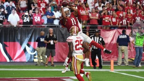 Larry Fitzgerald (11) made the game-winning catch with 32 seconds remaining in overtime to give the Arizona Cardinals an 18-15 victory over the San Francisco 49ers on Sunday afternoon. larry-fitzgerald