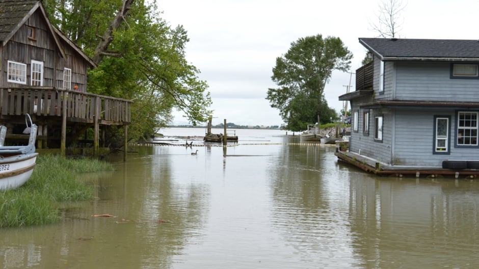Waters are rising in the tiny community of Finn Slough, B.C., a historic fishing village situated just outside the dikes protecting the Greater Vancouver Area