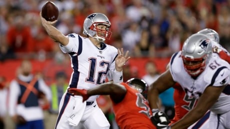 New England Patriots quarterback Tom Brady throws a pass against the Tampa Bay Buccaneers during the first quarter of their matchup on Thursday in Tampa, Fla. Patriots Buccaneers Football