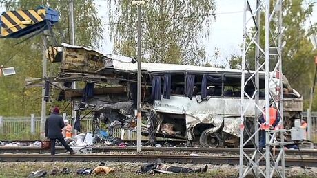 19 killed in Russia after train hits bus stuck on crossing