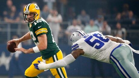 Green Bay Packers quarterback Aaron Rodgers threw for three touchdowns in Sunday's 35-31 comeback victory over the Dallas Cowboys. rodgers-aaron-packers