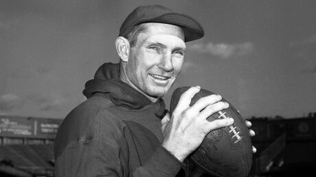 Former New York Giants quarterback Y.A. Tittle works out at Yankee Stadium in New York. Tittle, the Hall of Fame quarterback and 1963 NFL Most Valuable Player, has died. tittle