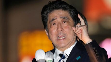 Japan's Prime Minister and President of the ruling Liberal Democratic Party Shinzo Abe delivers a speech in support for his party's candidate during an election campaign for the upcoming lower house election in Tokyo, Wednesday, Oct. 18, 2017. The lower house election is scheduled on Sunday, Oct. 22. Japan Election