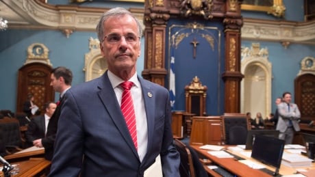 Independent MNA Guy Ouellette walks in to make a declaration over his arrest by the anti corruption unit at the legislature in Quebec City, Tuesday, October 31, 2017. The Quebec member of the legislature arrested by the province's anti-corruption unit is again accusing the organization of what he calls unprecedented intimidation. THE CANADIAN PRESS/ CRIME Que Legislature Arrest 20171031