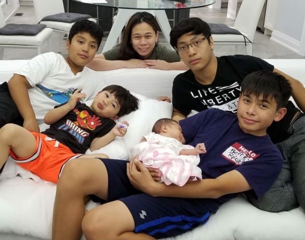Baby Eiko with mom and siblings