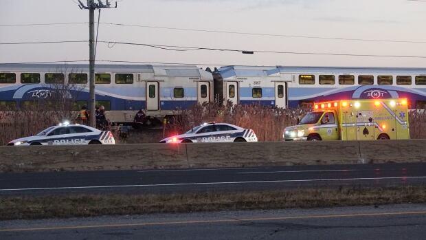 Longueuil police and paramedics are at the scene of a collision between a train and pedestrian.