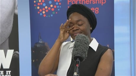 International student Nicolette Jones wipes away tears before asking the city to reconsider increasing transit fares by 25 cents. Nicolette Jones