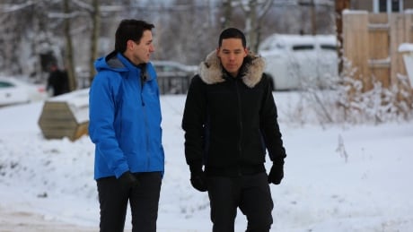 Prime Minister Justin Trudeau walks with Natan Obed, president of the Inuit Tapiriit Kanatami in Labrador. Natan Obed