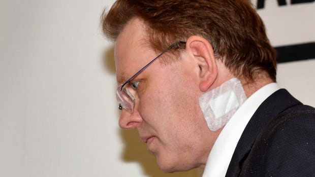 Pro-migrant mayor Andreas Hollstein knifed in the neck