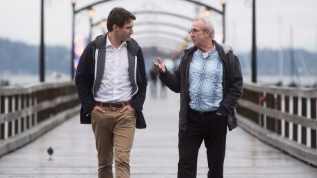 Prime Minister Justin Trudeau, left, and South Surrey-White Rock Liberal byelection candidate Gordie Hogg walk along the pier in White Rock, B.C., on Saturday, December 2, 2017. A federal byelection will be held Dec. 11 for the seat vacated by former Conservative MP Dianne Watts, who stepped down to run for the leadership of the B.C. Liberal Party. Trudeau Byelection 20171202
