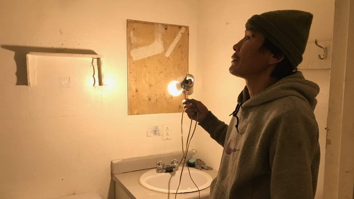 Living with limited running water, one light bulb and a wood stove in Fort Good Hope, N.W.T.