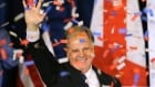 Doug Jones celebrates his victory in Alabama