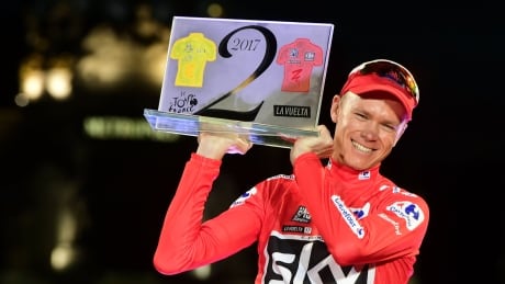 Team Sky's British cyclist Chris Froome, seen above celebrating his win at the Spanish Vuelta in September, is seeking to prove his innocence after a failed doping test from that event. froome-chris-091017-620