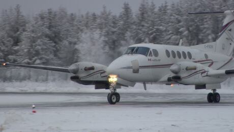A charter plane on the airstrip at Fond-du-Lac, Sask., airport. Charter plane