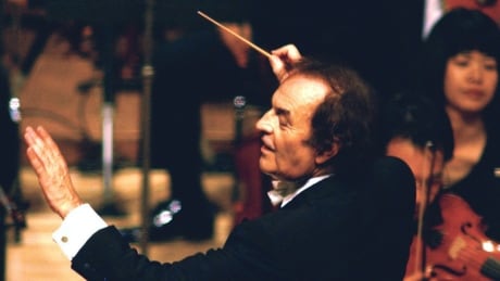 FILE - In this June 19, 2003 file photo, conductor Charles Dutoit performs with NHK Symphony Orchestra in Tokyo, Japan. Four women have accused Dutoit of sexual misconduct that allegedly occurred on the sidelines of rehearsals or performances with some of America's great orchestras. The 81-year-old is the artistic director and principal conductor at London's Royal Philharmonic Orchestra. (Kyodo News via AP) Sexual Misconduct Charles Dutoit