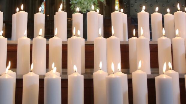 Lighting a digital, animated candle to mourn the deceased is one of the options presented to visitors on the Afterlife website. 