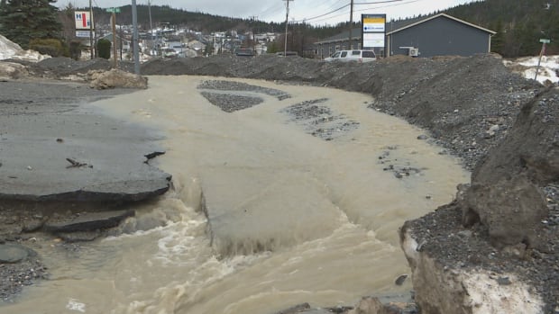 Heavy rainfall and snowmelt has done severe damage to Corner Brook roads and buildings, prompting the mayor to declare a state of emergency.