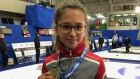 Pearl Gillis curling gold
