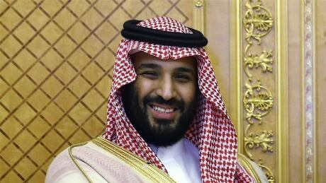 Saudi Crown Prince Mohammed bin Salman poses while meeting with Turkey's President Recep Tayyip Erdogan in Jeddah, Saudi Arabia, on July, 23, 2017. Iran‚'s top regional foes, Israel and Saudi Arabia, are both watching that country's protests for signs they could lead to change. Iran's supreme leader has accused enemies of stoking the unrest. Mohammed bin Salman