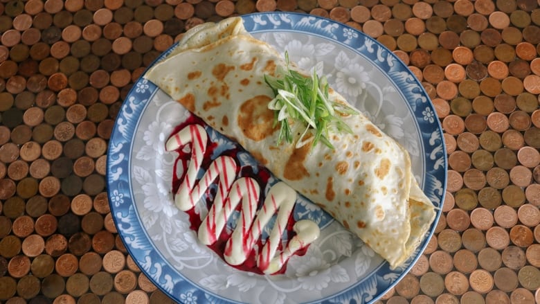 Toronto chef's take on a Trini staple swaps the roti for a crepe | CBC News